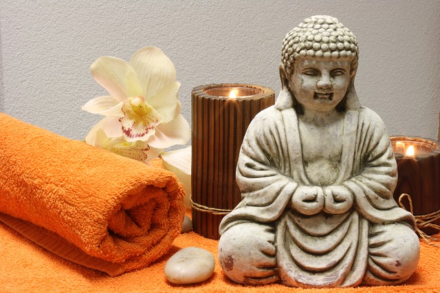 buddha, svíčky, ručník